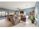 Spacious living room features a fireplace, reclining chairs and large windows at 2520 Links Dr, Laughlin, NV 89029