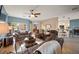 Living room with fireplace, comfortable seating, and access to kitchen at 2520 Links Dr, Laughlin, NV 89029
