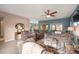 Living room with a fireplace, comfortable seating, and views into kitchen at 2520 Links Dr, Laughlin, NV 89029