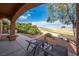 Covered patio with seating, offering scenic golf course views at 2520 Links Dr, Laughlin, NV 89029