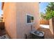 A view of the backyard featuring a cemented patio and gravel at 3396 Villa Fiori Ave, Las Vegas, NV 89141