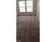 Bright bedroom with neutral carpeting and two windows at 4202 Mango Tree Ct, Las Vegas, NV 89115