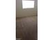 Simple bedroom with neutral carpeting and window at 4202 Mango Tree Ct, Las Vegas, NV 89115