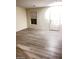 Living room with gray vinyl plank flooring at 4202 Mango Tree Ct, Las Vegas, NV 89115