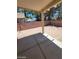 Backyard with covered patio and gravel landscaping at 43 Pangloss St, Henderson, NV 89002