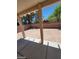 Small backyard with covered patio and gravel landscaping at 43 Pangloss St, Henderson, NV 89002