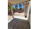 Small backyard with covered patio and gravel landscaping at 43 Pangloss St, Henderson, NV 89002