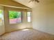 Bright bedroom with large window and neutral carpeting at 43 Pangloss St, Henderson, NV 89002