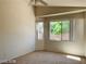 Spacious bedroom with window and ceiling fan at 43 Pangloss St, Henderson, NV 89002