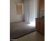 Cozy dining area with carpeted floors and sliding glass doors at 43 Pangloss St, Henderson, NV 89002
