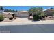 Single story home with attached garage and desert landscaping at 43 Pangloss St, Henderson, NV 89002