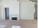 Living room featuring a fireplace and neutral color palette at 43 Pangloss St, Henderson, NV 89002