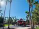 Community playground with palm trees and play equipment at 43 Pangloss St, Henderson, NV 89002