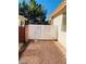 Side yard with gated access and gravel at 43 Pangloss St, Henderson, NV 89002