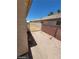 Side yard with gate and gravel landscaping at 43 Pangloss St, Henderson, NV 89002