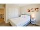 Cozy bedroom with a queen bed and built-in closet at 5062 Grandview Dr, Las Vegas, NV 89120