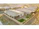 Aerial view of a luxury community with houses and a landscaped backyard at 52 Reverie Heights Ave, Henderson, NV 89011