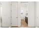 Clean bathroom with toilet and dark brown vanity at 52 Reverie Heights Ave, Henderson, NV 89011