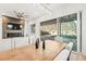 Bright dining area with large sliding doors opening to a backyard at 52 Reverie Heights Ave, Henderson, NV 89011