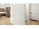 Bright entryway with wood flooring and a view of the kitchen at 52 Reverie Heights Ave, Henderson, NV 89011