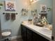 Double vanity bathroom with modern fixtures at 5400 Paul Kurtz Way # 102, Las Vegas, NV 89108