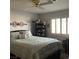 Primary bedroom with window and shelving at 5400 Paul Kurtz Way # 102, Las Vegas, NV 89108