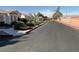 Residential street with well-maintained landscaping and homes at 5400 Paul Kurtz Way # 102, Las Vegas, NV 89108