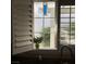 Kitchen window with view of backyard and bird feeder at 5400 Paul Kurtz Way # 102, Las Vegas, NV 89108