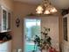 Kitchen with view to backyard and sliding door access at 5400 Paul Kurtz Way # 102, Las Vegas, NV 89108