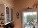 Kitchen with view to backyard and sliding door access at 5400 Paul Kurtz Way # 102, Las Vegas, NV 89108