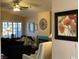 Living room with fireplace, comfortable seating, and large windows at 5400 Paul Kurtz Way # 102, Las Vegas, NV 89108