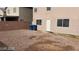 Backyard with gravel, and a view of the house at 5987 Stone Hollow Ave, Las Vegas, NV 89156