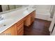 Double vanity bathroom with soaking tub at 5987 Stone Hollow Ave, Las Vegas, NV 89156