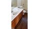 Clean bathroom with wood-look flooring and vanity at 5987 Stone Hollow Ave, Las Vegas, NV 89156