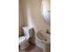 Clean bathroom with pedestal sink and oval mirror at 5987 Stone Hollow Ave, Las Vegas, NV 89156