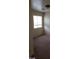 Spacious bedroom with carpeted flooring and a large window at 5987 Stone Hollow Ave, Las Vegas, NV 89156