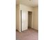 Bedroom with sliding door closet and carpeted floor at 5987 Stone Hollow Ave, Las Vegas, NV 89156