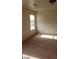 Bright bedroom with neutral carpeting and large window at 5987 Stone Hollow Ave, Las Vegas, NV 89156