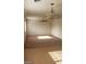 Bright dining room with tile floors and ceiling fan at 5987 Stone Hollow Ave, Las Vegas, NV 89156