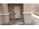 Front door entrance with sidelights and a small stoop at 5987 Stone Hollow Ave, Las Vegas, NV 89156
