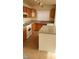 Modern kitchen with granite countertops and a breakfast bar at 5987 Stone Hollow Ave, Las Vegas, NV 89156