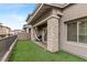 Private backyard with artificial turf and hammock at 600 N Carriage Hill Dr # 1108, Las Vegas, NV 89138