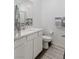Clean bathroom with white vanity and patterned rug at 600 N Carriage Hill Dr # 1108, Las Vegas, NV 89138