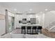 Modern kitchen with island, stainless steel appliances, and white cabinetry at 600 N Carriage Hill Dr # 1108, Las Vegas, NV 89138