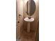 Small bathroom with pedestal sink and oval mirror at 6684 Coronado Crest Ave, Las Vegas, NV 89139