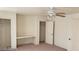Bedroom with ceiling fan, built-in desk, and closet at 6684 Coronado Crest Ave, Las Vegas, NV 89139