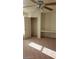 Bright bedroom with ceiling fan, built-in shelving, and spacious closet at 6684 Coronado Crest Ave, Las Vegas, NV 89139