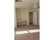 Bedroom with ceiling fan, built-in desk, and closet at 6684 Coronado Crest Ave, Las Vegas, NV 89139