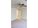 Spacious bedroom with ceiling fan and neutral decor at 6684 Coronado Crest Ave, Las Vegas, NV 89139