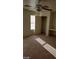 Well-lit bedroom featuring a ceiling fan and ample closet space at 6684 Coronado Crest Ave, Las Vegas, NV 89139